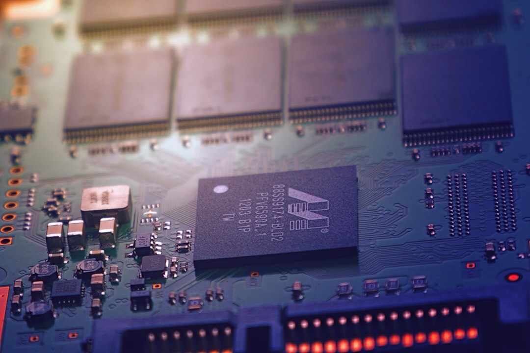 Circuit board technology close-up with blue glowing light